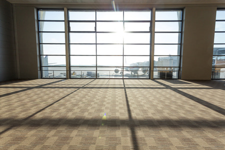 transparent  glass wall in airport corridor interiorのeditorial素材