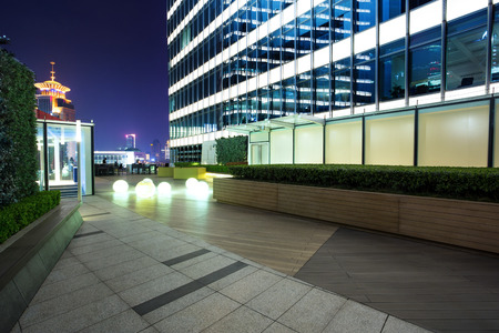 Illuminated building exterior and footpathのeditorial素材