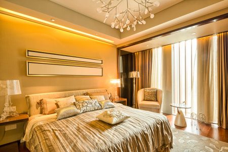 luxury hotel bedroom with upscale furniture and modern style decorationのeditorial素材