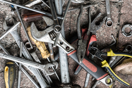 closeup view of work tools on brick groundのeditorial素材