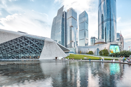 skyscrapers and museum along the waterside in modern cityのeditorial素材