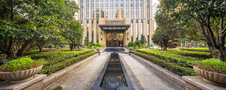 mansion as background of a park with a channelのeditorial素材