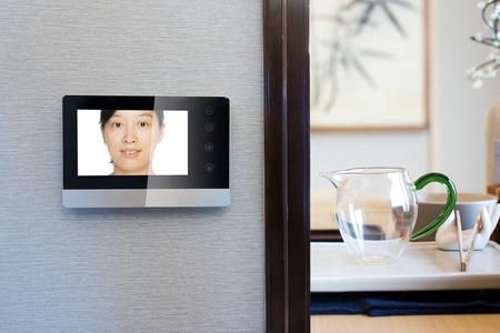 intercom video door bell on the wall outside modern dining roomのeditorial素材