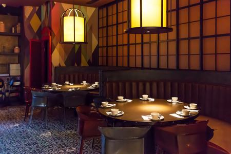 modern room with tables and chairs in shopping mallのeditorial素材