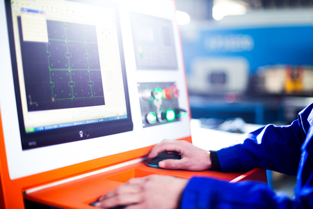 technician controls monitor in equipmentのeditorial素材