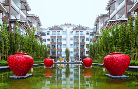 business building near pond with clean waterのeditorial素材