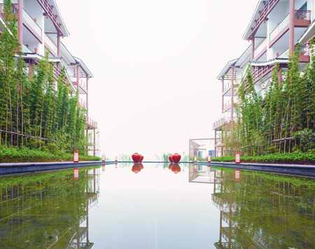 business building near pond with clean waterのeditorial素材