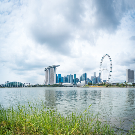 landmark buildings near marina bay in singapore from waterのeditorial素材