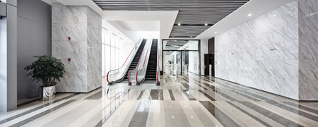 interior of center with escalator in modern office buildingのeditorial素材