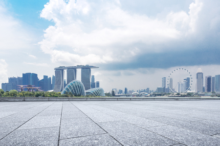 empty marble floor and cityscape of singapore in cloud skyのeditorial素材