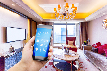 smart phone with smart home and modern living roomのeditorial素材