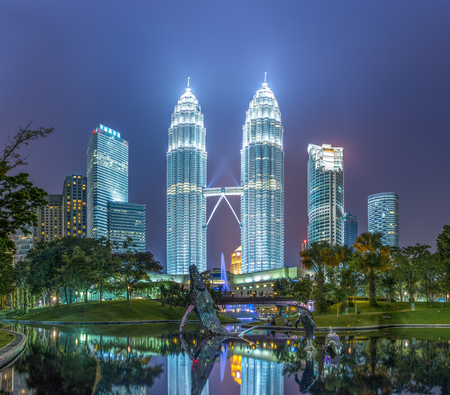 modern buildings in midtown of kuala lumpur at night from low angle のeditorial素材