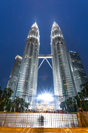 night scene of modern landmark buildings in kuala lumpur in clear skyのeditorial素材