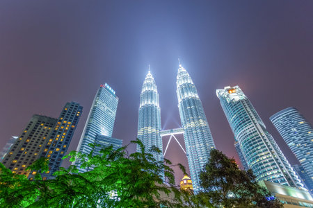 night scene of modern landmark buildings in kuala lumpur