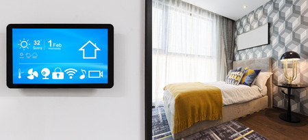 smart home system on intelligence screen on wall and background of modern bedroomのeditorial素材