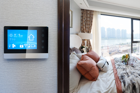 smart home system on intelligence screen on wall and background of modern bedroomのeditorial素材