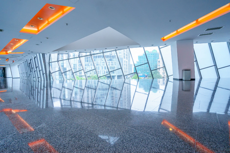 empty bright corridor with glass windowのeditorial素材