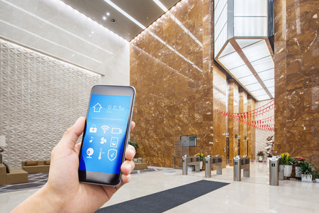 mobile phont with smart home in modern officeのeditorial素材