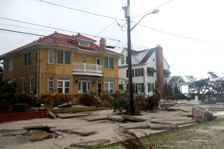 FAR ROCKAWAY, NY -OCTOBER 30: Street completely covered with sand and broken concrete in the aftermath of Hurricane Sandy on October 30, 2012 in Far Rockaway, NY   のeditorial素材