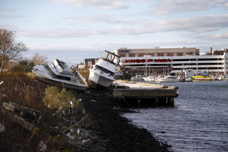 BROOKLYN, NY - NOVEMBER 4:Boats cast ashore in the aftermath of Hurricane Sandy on November 4, 2012 in Brooklyn, NYのeditorial素材