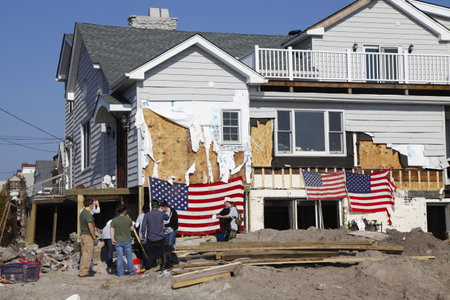 FAR ROCKAWAY, NY - NOVEMBER11:Volunteers help to rebuild New York in the aftermath of Hurricane Sandy on November11, 2012 in Far Rockaway, NYのeditorial素材
