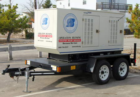 BREEZY POINT, NY - NOVEMBER 15: Disaster relief services electrical generator located at devastated area  in the aftermath of Hurricane Sandy on November 15, 2012 in Breezy Point, NYのeditorial素材