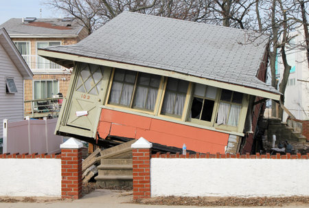 BREEZY POINT, NY - NOVEMBER 15: Destroyed beach house in the aftermath of Hurricane Sandy on November 15, 2012 in Breezy Point, NYのeditorial素材