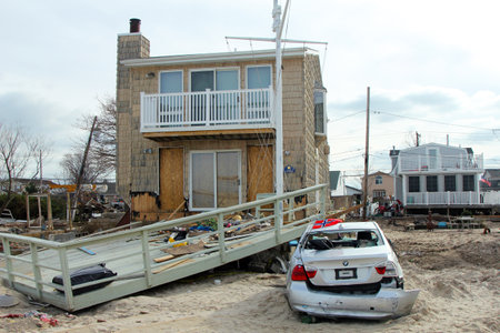 BREEZY POINT, NY - NOVEMBER 15: Destroyed car in the aftermath of Hurricane Sandy on November 15, 2012 in Breezy Point, NYのeditorial素材