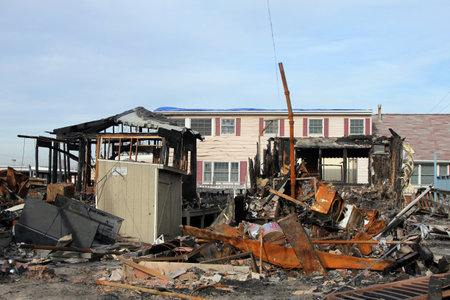 BREEZY POINT, NY - NOVEMBER 20: Burned houses in the aftermath of Hurricane Sandy on November 20, 2012 in Breezy Point, NY. More than 80 houses were destroyed in out-of-control six-alarm blaze.のeditorial素材