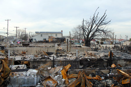 BREEZY POINT, NY - NOVEMBER 20: Burned houses in the aftermath of Hurricane Sandy on November 20, 2012 in Breezy Point, NY. More than 80 houses were destroyed in out-of-control six-alarm blaze.のeditorial素材