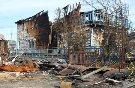 BREEZY POINT, NY - NOVEMBER 20: Burned houses in the aftermath of Hurricane Sandy on November 20, 2012 in Breezy Point, NY. More than 80 houses were destroyed in out-of-control six-alarm blaze.のeditorial素材