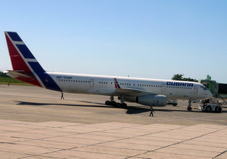 SANTO DOMINGO, DOMINICAN REPUBLIC - JANUARY 3: Cubana airlines Tu-204 jet leaving gate at Las Américas International Airport on January 3, 2013 in Santo Domingo.  Cubana  is Cuba's largest airline and flag carrier.のeditorial素材