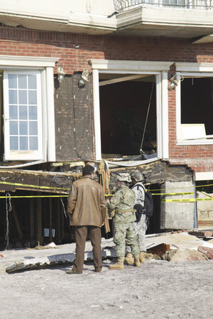 FAR ROCKAWAY, NY - NOVEMBER 11:US National Guards ready to help in the aftermath of Hurricane Sandy on November 11, 2012 in Far Rockaway, NY のeditorial素材
