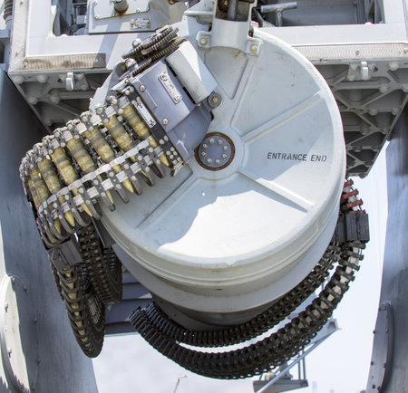 STATEN ISLAND, NEW YORK - MAY 29:Round of ammunition loaded into .50-caliber machine gun on US Navy destroyer  during Fleet Week 2012 on May 29, 2012 in Staten Island, New Yorkのeditorial素材