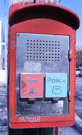 BROOKLYN,NEW YORK - FEBRUARY 14: Emergency Reporting System box with buttons to notify the police and fire department February 14, 2013 in Brooklyn, New York のeditorial素材