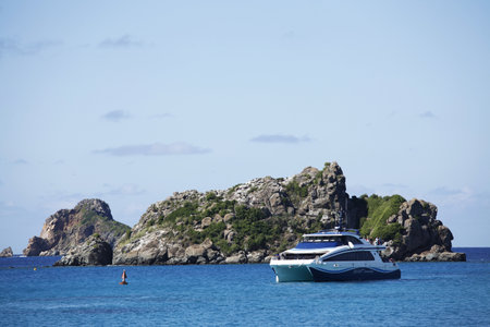 ST. BARTHS, CARIBBEAN - NOVEMBER 6: Speed boat Voyager arriving to St. Barths marina from St. Martin on November 6, 2012. St. Barts is considered a playground of the rich and famous.のeditorial素材
