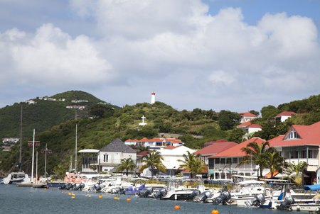 ST BARTHS, FRENCH WEST INDIES - NOVEMBER 8:Waterfront at Gustavia Harbor on November 8, 2012 at St Barths. The island is popular tourist destination during the winter holiday season  のeditorial素材