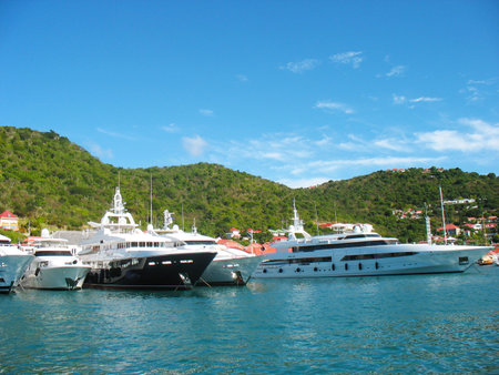 ST BARTS, FRENCH WEST INDIES - JANUARY16: Mega yachts in  Gustavia Harbor  on January 16, 2006 at St Barts. The island is popular tourist destination during the winter holiday seasonのeditorial素材