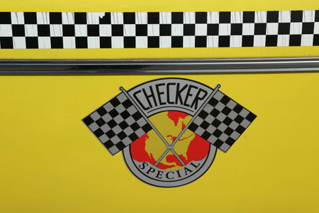 NEW YORK - APRIL 9:Checker Taxi Cab produced by the Checker Motors Corporation In New York on April 9, 2013. The Checker  remains the most famous taxi cab vehicle in the United Statesのeditorial素材