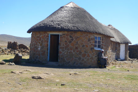  SANI PASS, LESOTHO - SEPTEMBER 19, 2009: Traditional style of housing in Lesotho at Sani Pass on September 19, 2009 at altitude of 2 874m. The Kingdom of Lesotho, is a landlocked country and enclaveのeditorial素材