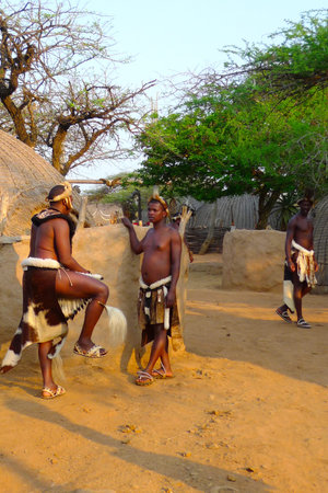 ZULULAND, SOUTH AFRICA - SEPTEMBER 14: Zulu warriors in Shakaland Zulu Village on September 14,...