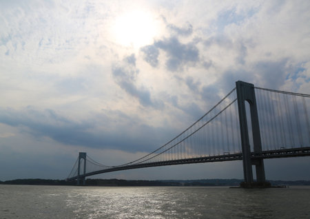 NEW YORK CITY - JUNE 16:Verrazano Bridge at dusk in New York on June 16, 2013. The Verrazano Bridge is a double-decked suspension bridge that connects the boroughs of Staten Island and Brooklyn のeditorial素材