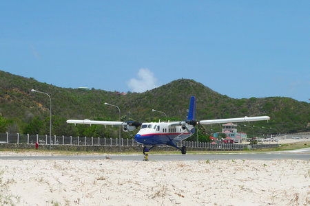 ST. BARTS, FRENCH WEST INDIES - JUNE 13: Winair plane landed at St Barts airport on June 13, 2009. At 2,133 ft its runway is one of the shortest in the worldのeditorial素材