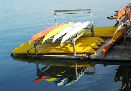 BAR HARBOR, MAINE - JULY 6: Sea kayaks ready for tourists in Bar Harbor on July 6, 2013. Bar Harbor is a famous summer colony in the Down East region of Maine のeditorial素材