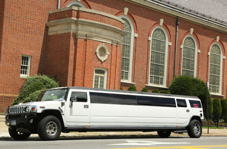 BROOKLYN, NY - JULY 14: Stretch limousine in front of the church in Brooklyn on July 14, 2013. The first stretch limousine was created in Fort Smith, AR around 1928 by a coach company named Armbrusterのeditorial素材