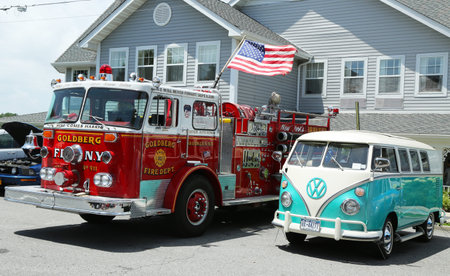 BROOKLYN, NEW YORK - JULY 14:Fire truck and 1966 Volkswagen Bus Vanagon on display at the Mill Basin...