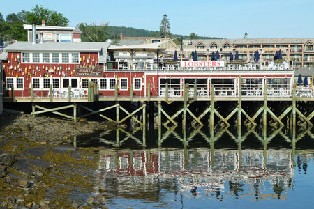 BAR HARBOR, MAINE - JULY 6: Dockside lobster restaurant in historic Bar Harbor on July 6, 2013. Bar Harbor is a famous location in Down East Maine with a long history of lobstering 