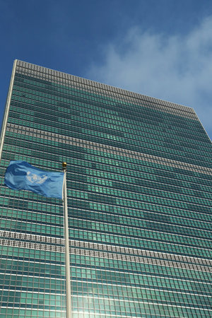 United Nations Flag in front of UN Headquarter in New York のeditorial素材