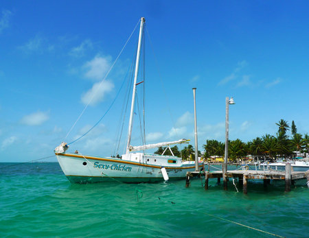 CAYE CAULKER, BELIZE - JUNE 10  Yacht at Caye Caulker, Belize  Caye Caulker is a small island off the coast of Belize in the Caribbean Sea  It is a popular destination for backpackers and  touristsのeditorial素材