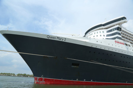 NEW YORK CITY - JULY 27: Queen Mary 2 cruise ship docked at Brooklyn Cruise Terminal on July 27, 2013. Queen Mary 2 is Cunard s flagship ready for Transatlantic Crossing  from New York to  Southamptonのeditorial素材